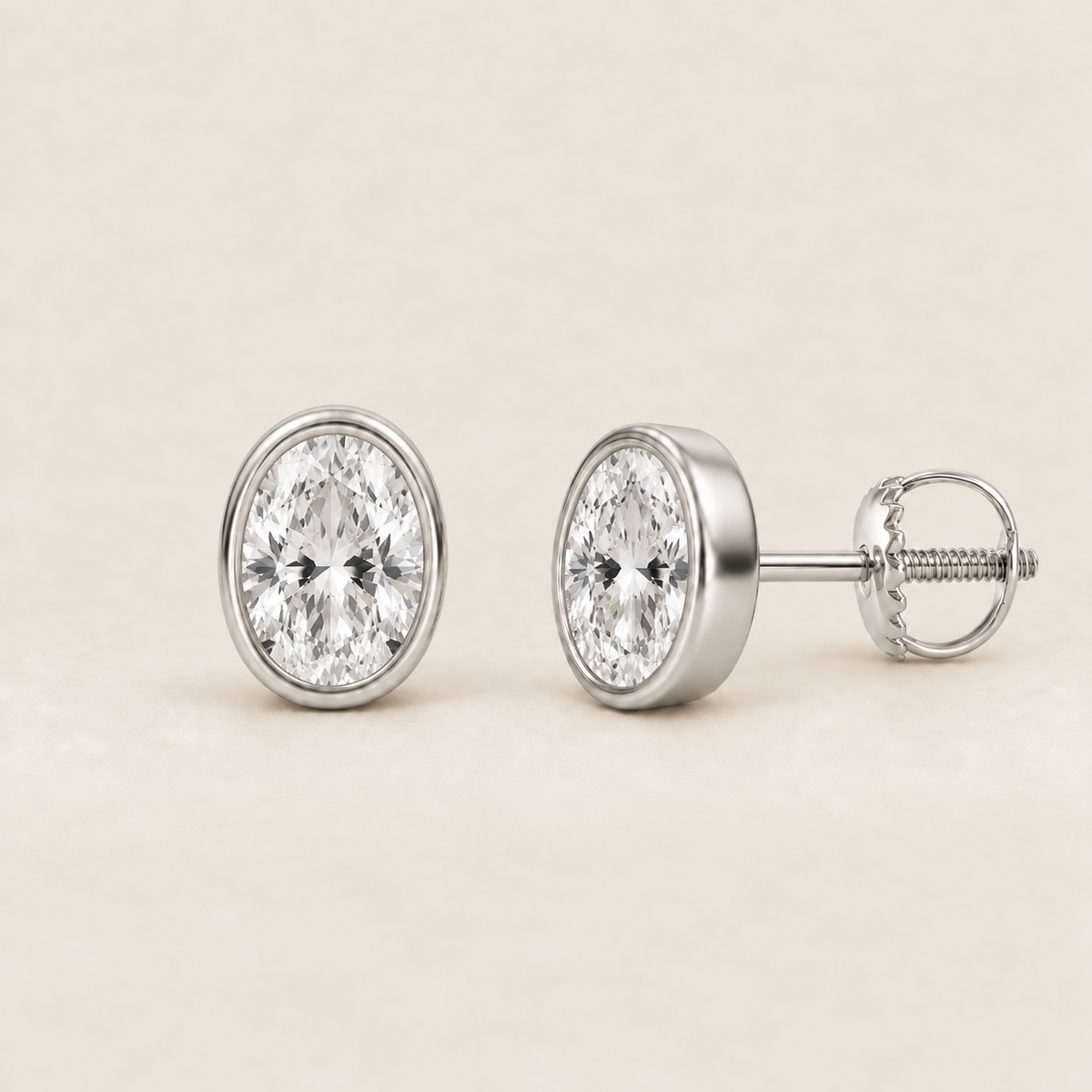 Oval lab-grown diamond stud earrings, 14K white gold, 1 CT total weight per pair, bezel setting with screw backs
