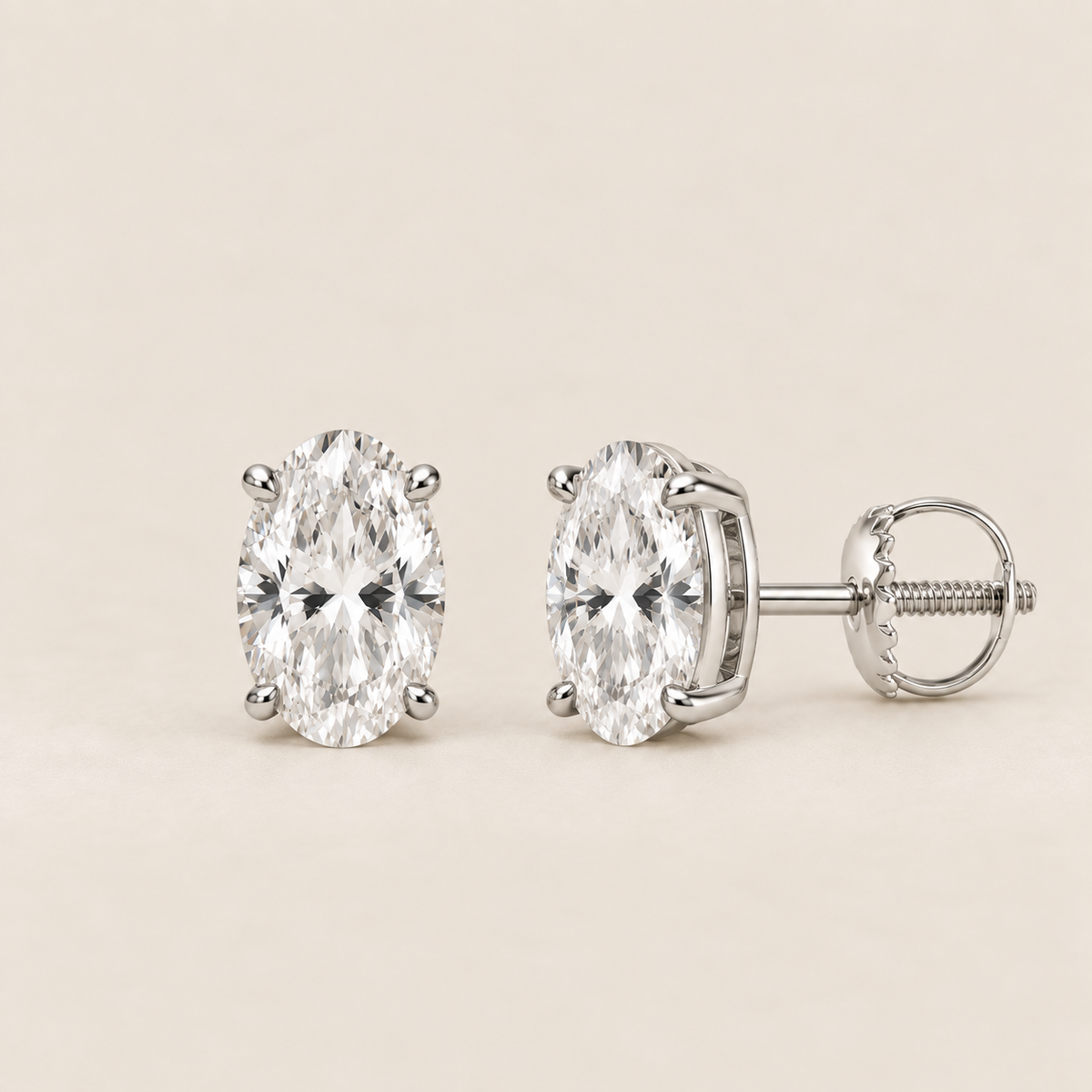Oval lab-grown diamond stud earrings, 14K white gold, 1 CT total weight per pair, classic setting with screw backs