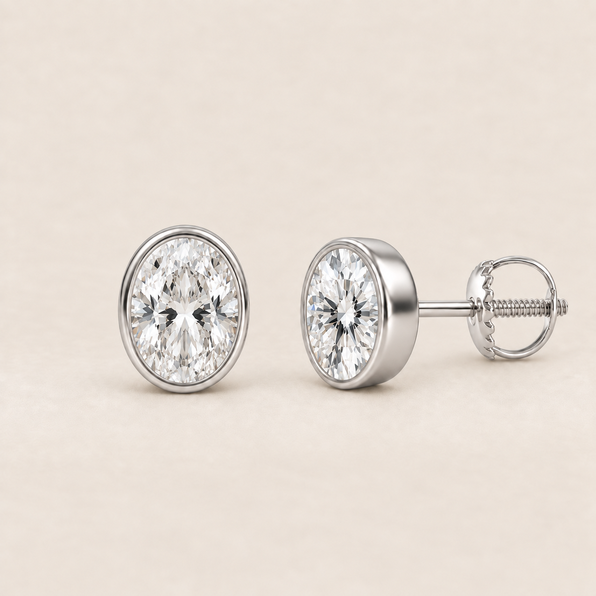 Oval lab-grown diamond stud earrings, 14K white gold, 2 CT total weight per pair, bezel setting with screw backs