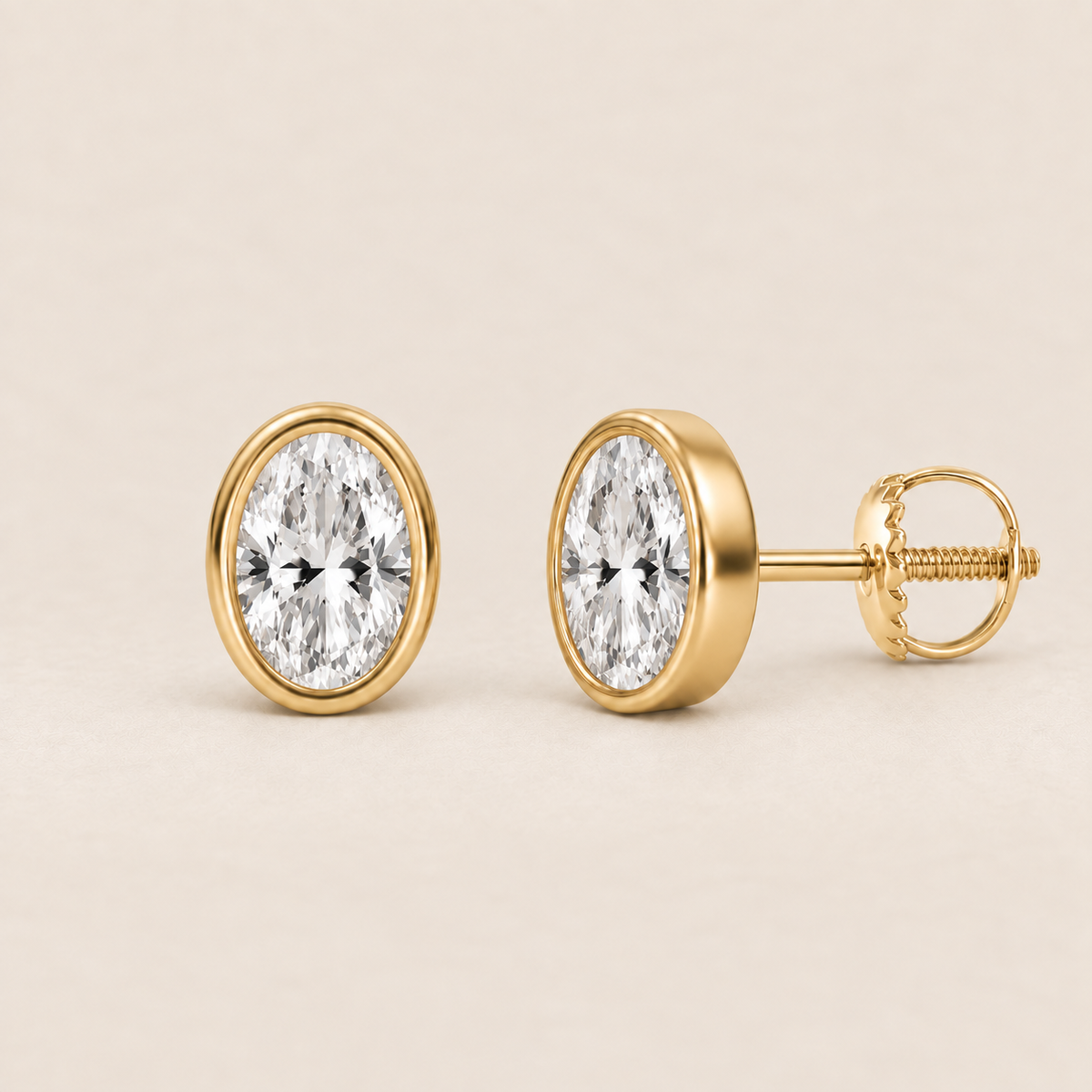 Oval lab-grown diamond stud earrings, 14K yellow gold, 1 CT total weight per pair, bezel setting with screw backs
