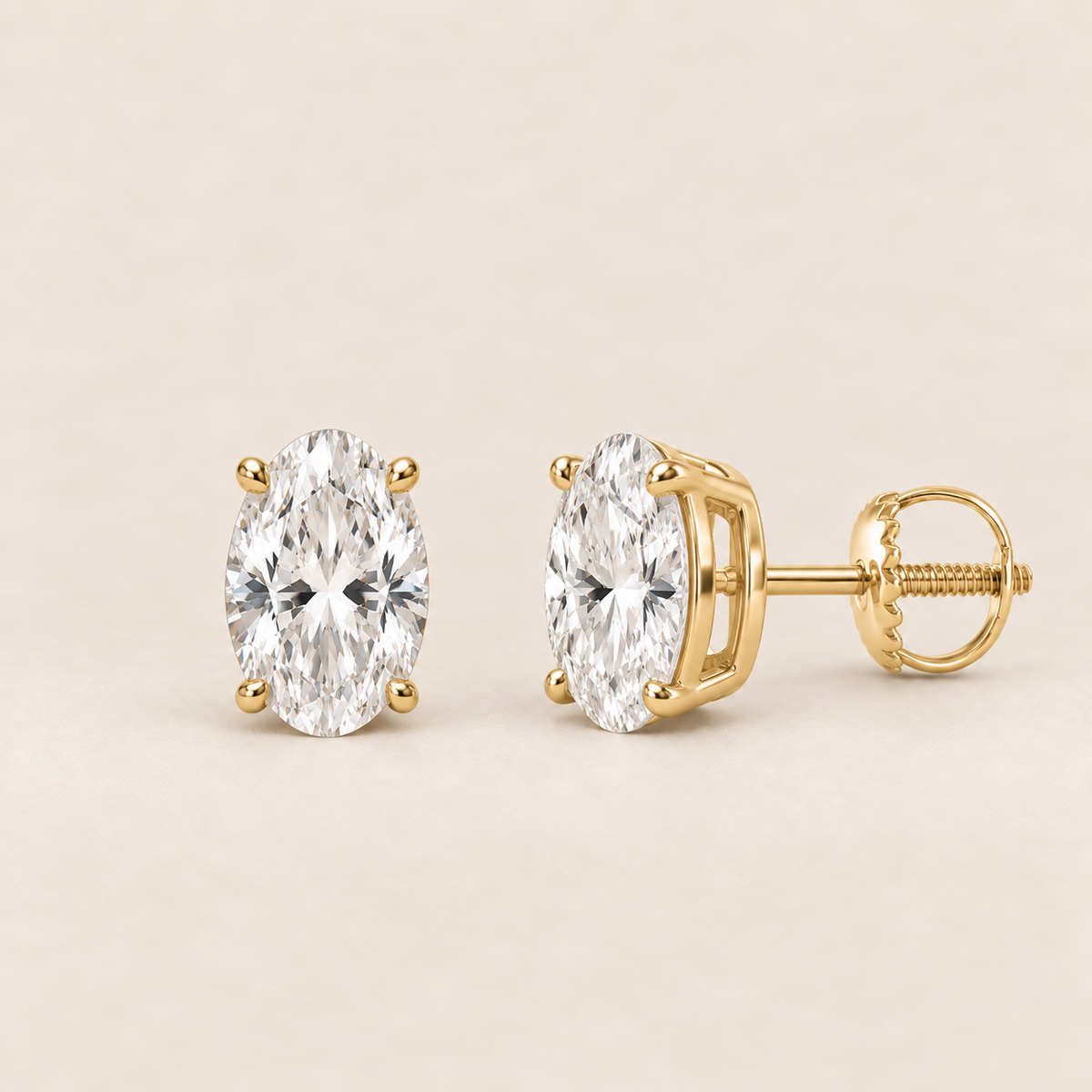 Oval lab-grown diamond stud earrings, 14K yellow gold, 1.5 CT total weight per pair, classic setting with screw backs