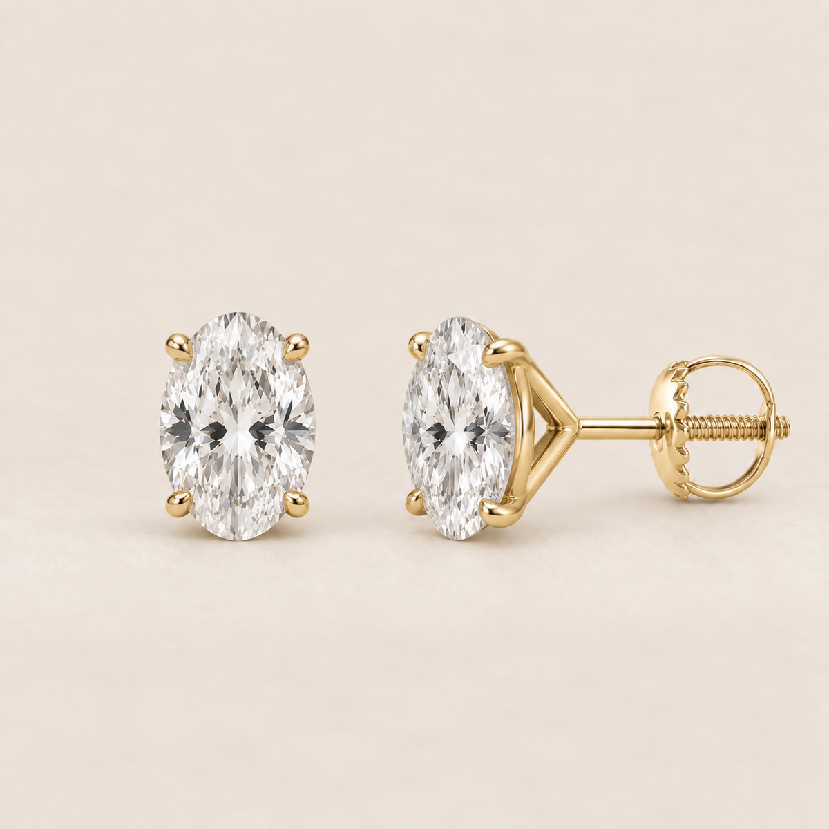 Oval lab-grown diamond stud earrings, 14K yellow gold, 1.5 CT total weight per pair, martini setting with screw backs