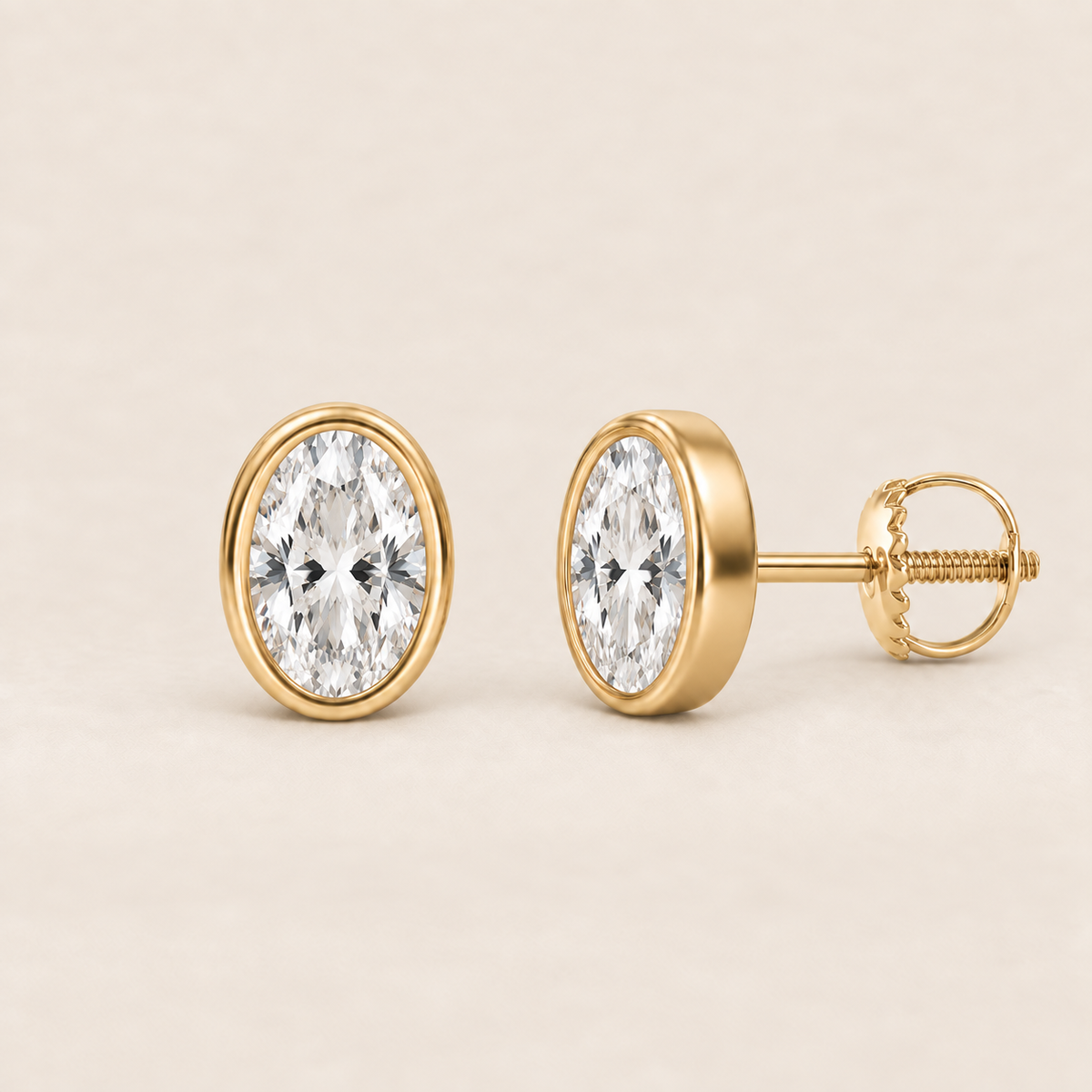 Oval lab-grown diamond stud earrings, 14K yellow gold, 2 CT total weight per pair, bezel setting with screw backs